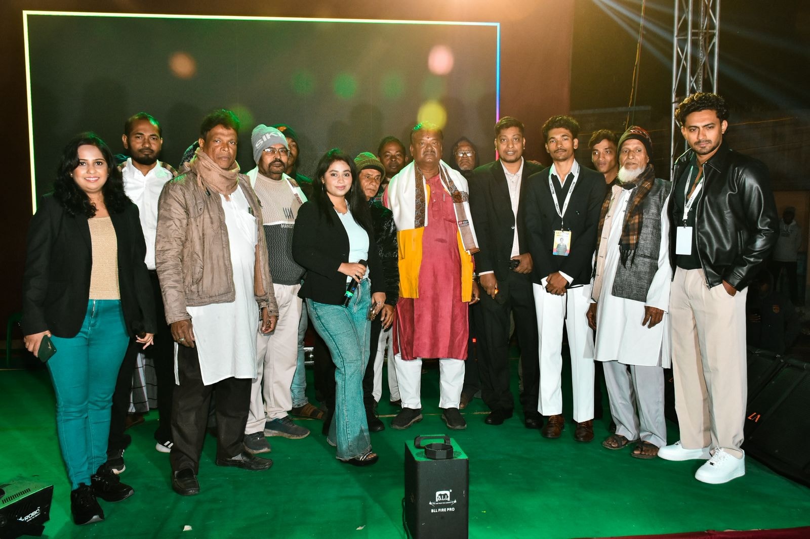Group posing on the Ku Ruk Shetra event stage