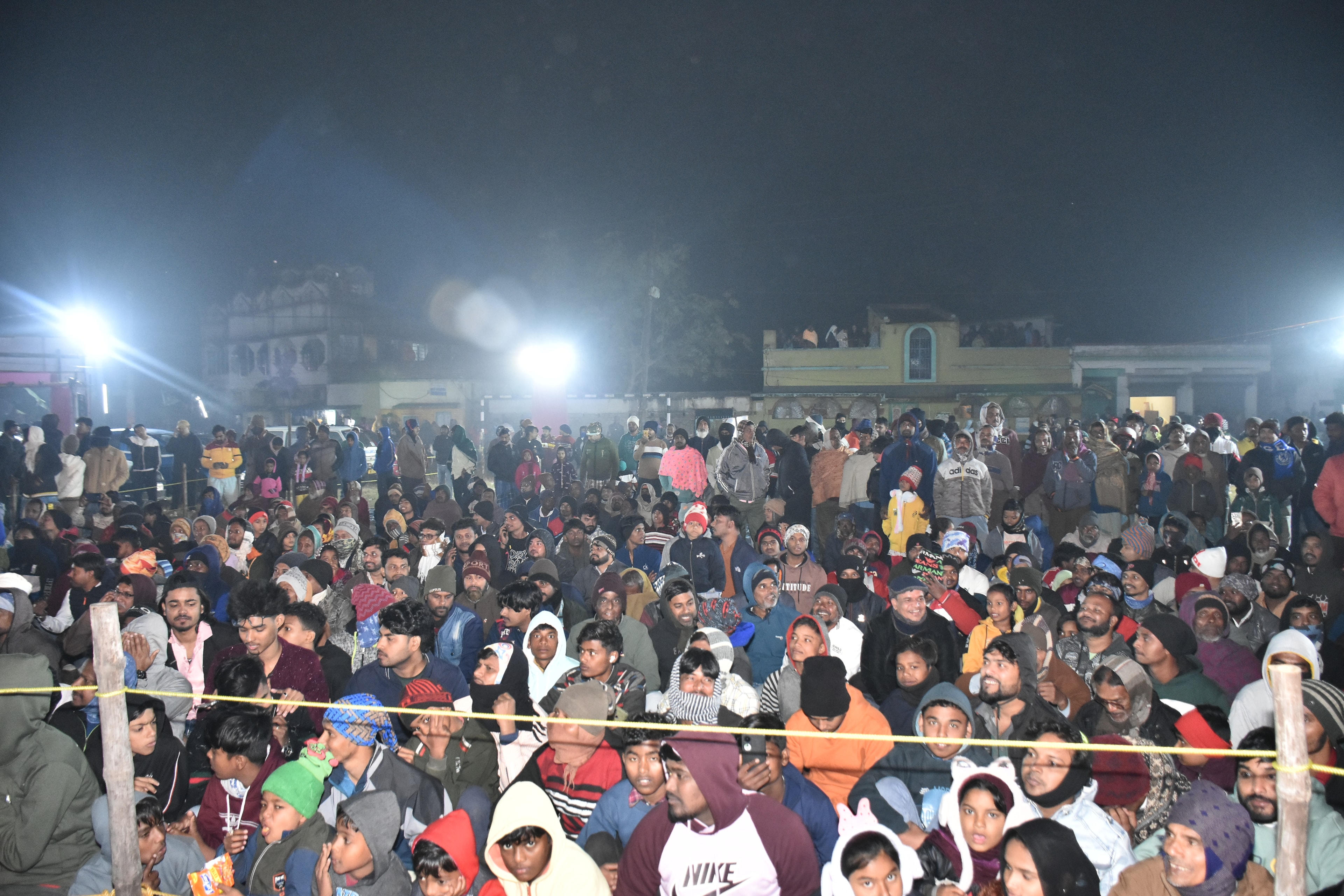 Ku Ruk Shetra crowd gathered outdoors at night