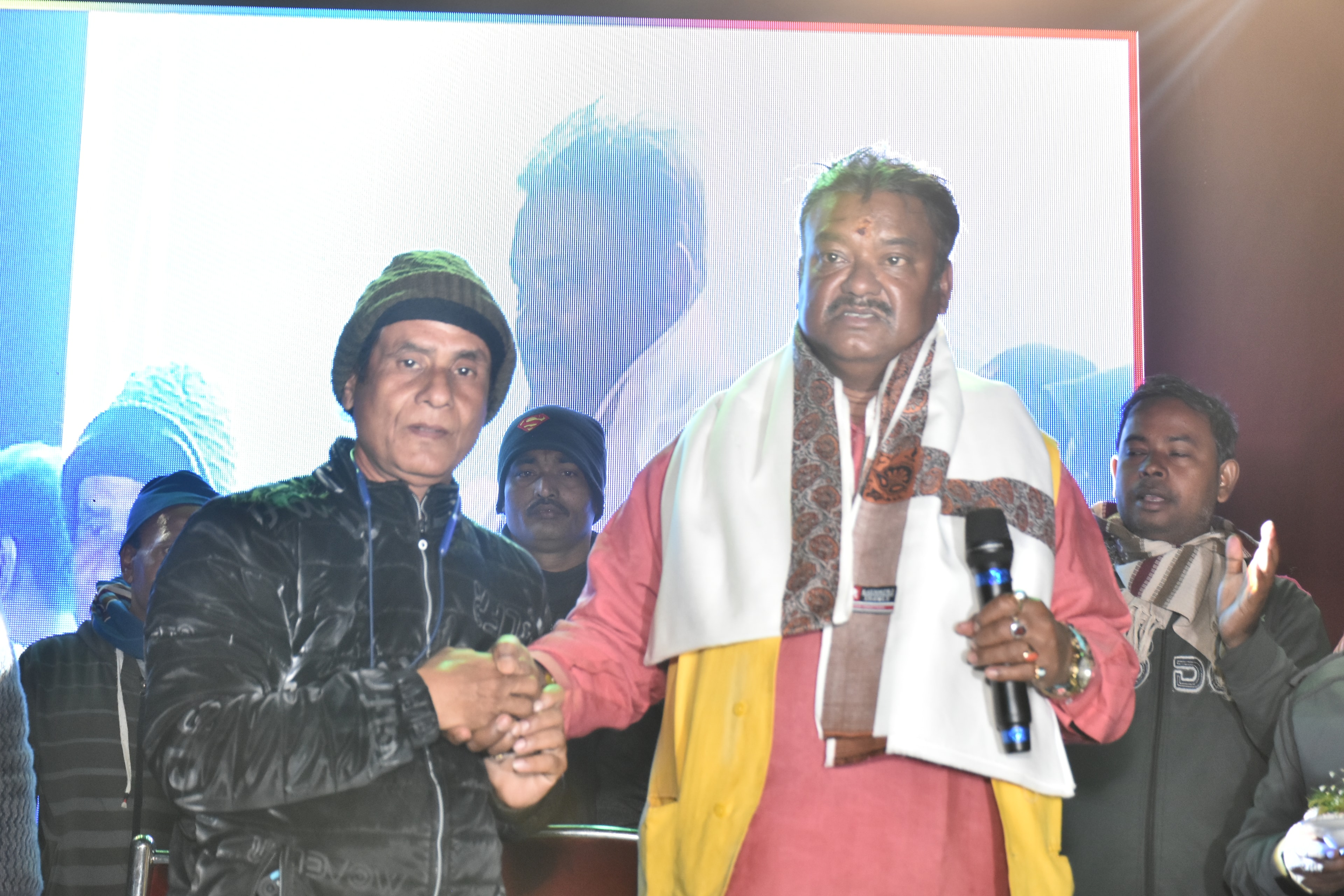 Onstage handshake at Ku Ruk Shetra