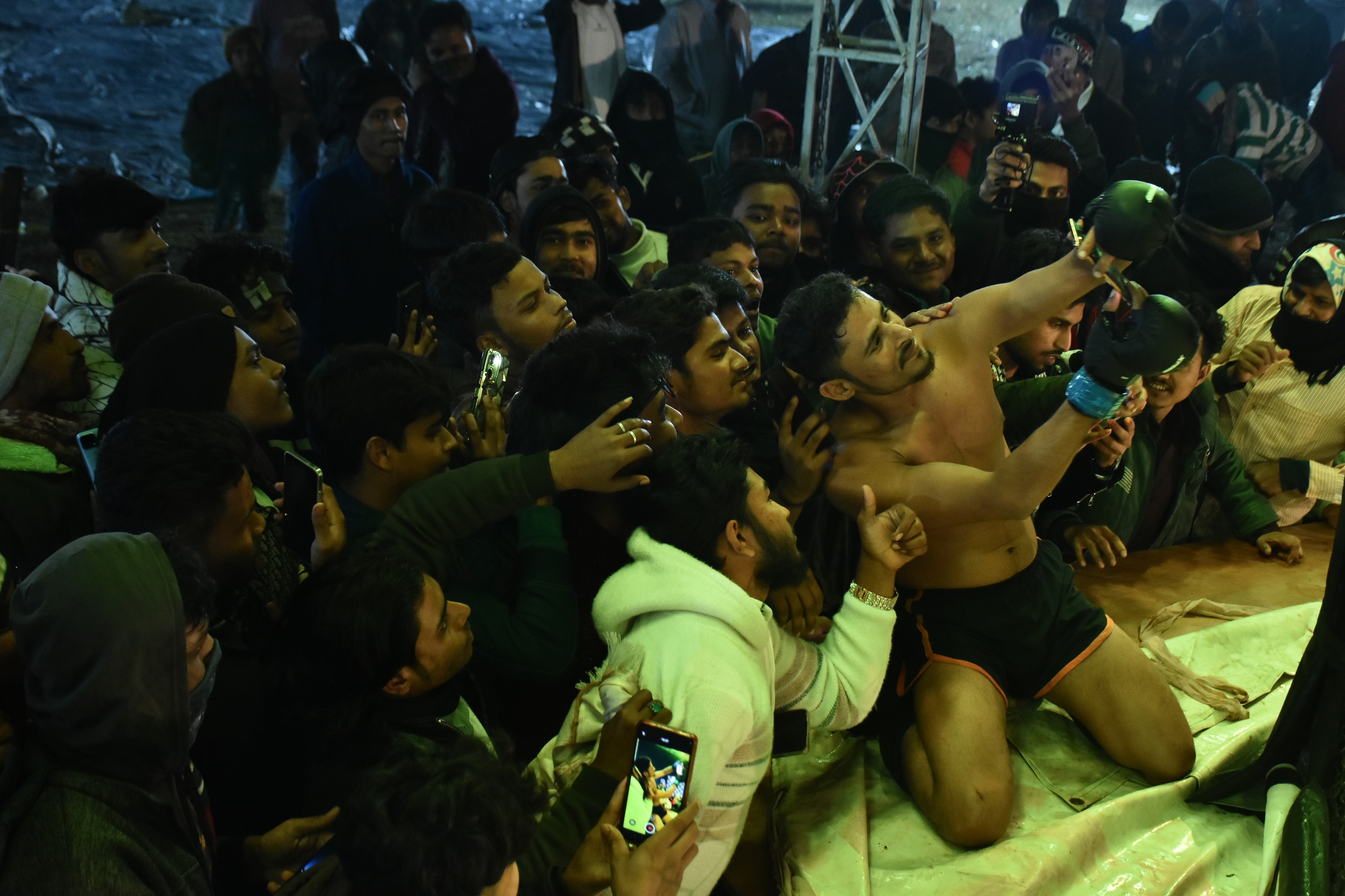 Fighter celebrating with the cheering crowd